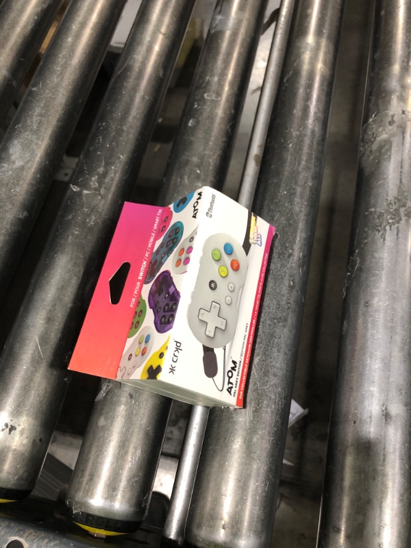 Photo 1 of CRKD ATOM - Collectible Keychain Controller for Nintendo Switch, PC, Mac, Mobile and Smart TV (PAL Grey)