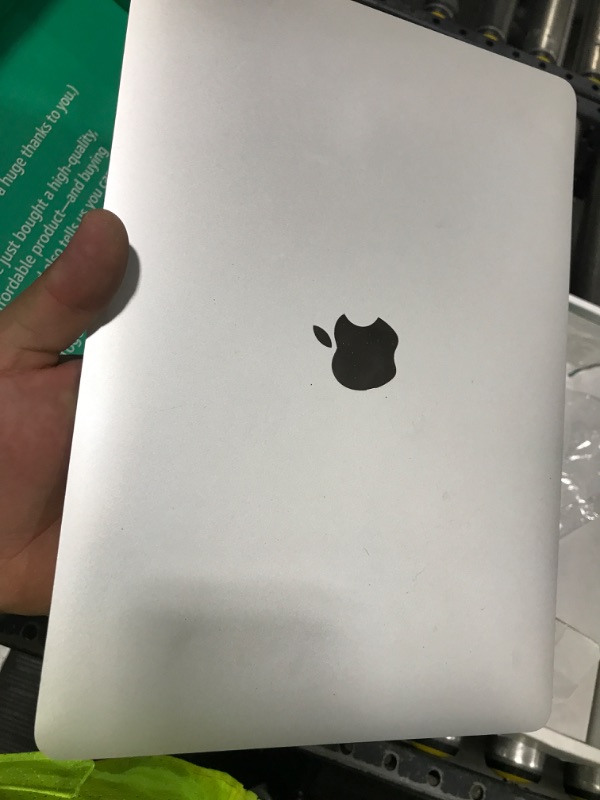 Photo 1 of Apple Late 2020 MacBook Air with Apple M1 Chip, 13-inch, 8GB RAM, 256GB SSD, Silver (Renewed Premium)