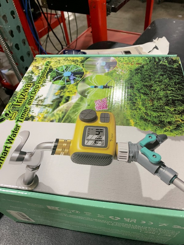 Photo 1 of TRJZWA Drip Irrigation System Kit with Water Timer 100FT?1/2 inch Hose 1/4 inch Distribution Tubing?Water Timer for Garden Hose with Anti-Leakage Quick Connector and Drip Emitters,for Potted Plant