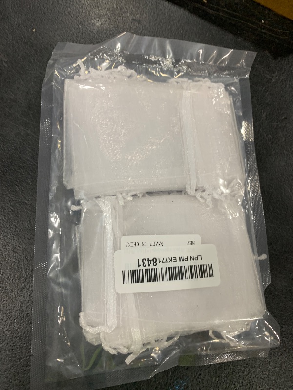 Photo 1 of ANZNKU 50 Pack White Organza Bags 3x4 Inch, Small Mesh Gift Bags Drawstring Favor Bag for Candy Party Wedding Christmas