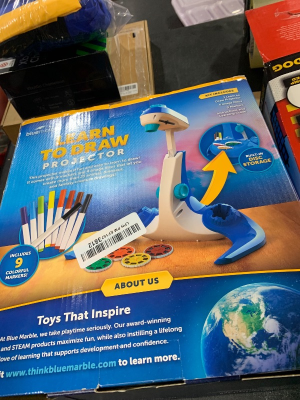 Photo 1 of Blue Marble Learn to Draw Projector - Kids Image Projector for Tracing with 9 Colorful Markers & 4 Image Discs with 25 Animals, Dinos & Creatures to Draw, Patent-Pending Drawing Projector for Kids
