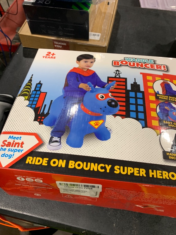 Photo 1 of Waddle Bouncy Animal Hopper - Inflatable Hopping Animals, Indoors and Outdoors Fun, Pump Included, Riding Toys for Boys and Girls Ages 2 Years and Up, Blue Super Hero Dog