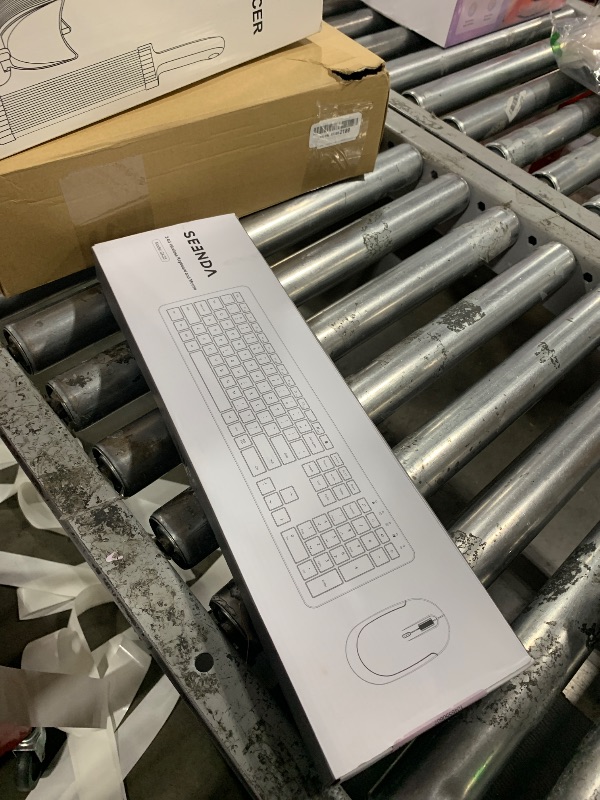 Photo 1 of Wireless Keyboard and Mouse Combo - Full Size Slim Thin Wireless Keyboard Mouse with Numeric Keypad 2.4G Stable Connection Adjustable DPI (White & Silver)