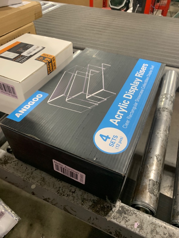 Photo 1 of ANDGOO Large Acrylic Risers, 12 Pack 4 Set Clear Rectangular Stands for Display, Tiered Acrylic Shelves for Decor, Collectibles, Dessert Table, Retail Display Shelf Showcases