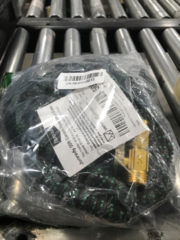 Photo 1 of Garden Hose 50 FT, NON-EXPANDABLE Heavy-Duty Flexible & Lightweight Water Hose with 10-Function Nozzle, No-Kink Design, Leak-Proof Super Fabric, Solid Fittings for Lawn, Car, RV