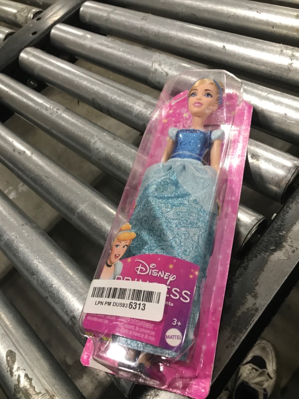 Photo 1 of Mattel Disney Princess Toys, Cinderella Fashion Doll, Sparkling Look with Blonde Hair, Blue Eyes & Hair Accessory, Inspired by the Movie