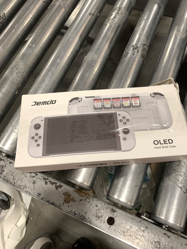 Photo 1 of JEMDO Dockable Protective Case for Nintendo Switch OLED 2021 with 5 Game Card Slots,Ergonomic Comfort Grip, Shockproof Dockable Cover Accessories,Tempered Glass, Joy-Con Thumb Grips,White-Set