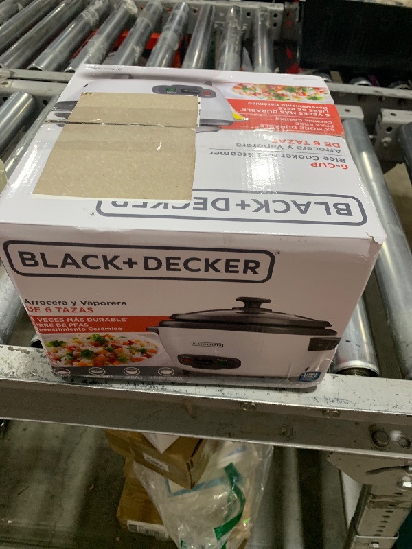 Photo 1 of BLACK+DECKER 6-Cup Rice Cooker, RC506, 3-cup Uncooked Rice, Steaming Basket, Removable Non-Stick Bowl, One Touch