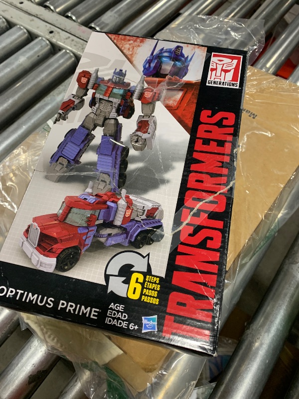 Photo 1 of Transformers Toys Heroic Optimus Prime Action Figure - Timeless Large-Scale Figure, Changes into Toy Truck - Toys for Kids 6 and Up, 11-inch (Amazon Exclusive)