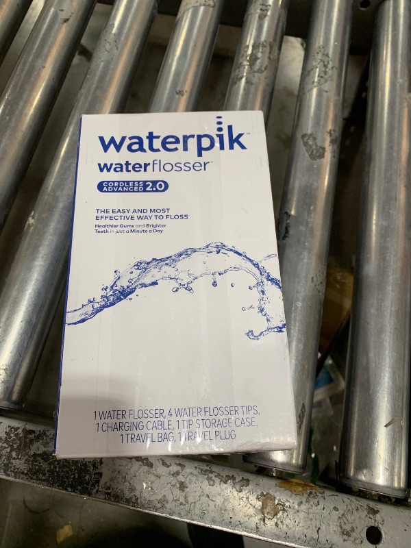 Photo 1 of Waterpik Cordless Advanced 2.0 Water Flosser For Teeth, Gums, Braces, Dental Care With Travel Bag and 4 Tips, ADA Accepted, Rechargeable, Portable, and Waterproof, Blue WP-583, Packaging May Vary