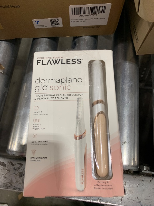 Photo 1 of Finishing Touch Flawless Dermaplane Glo Sonic Lighted Facial Exfoliator, Electric Vibrating Dermaplane Razor for Dermaplaning, Facial Hair Removal, 6 Replacement Heads