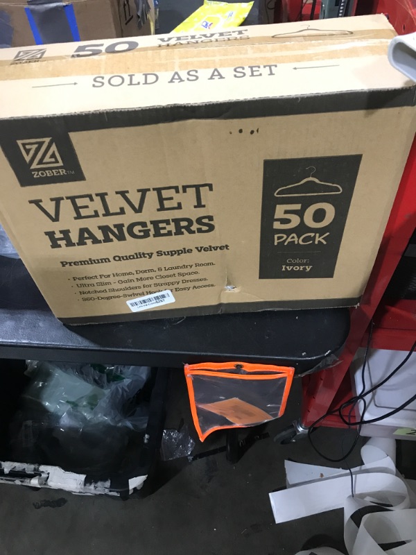 Photo 1 of Zober Velvet Hangers 50 Pack - Ivory for Coats, Pants & Dress Clothes - Non Slip w/ 360 Degree Swivel, Holds up to 10 lbs - Strong Felt Hangers for Clothing
