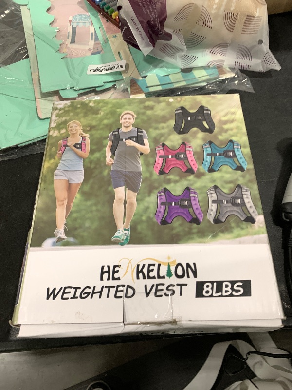 Photo 1 of Henkelion Weighted Vest Weight Vest for Men Women Kids Weights Included, Body Weight Vests Adjustable for Running, Training Workout, Jogging, Walking