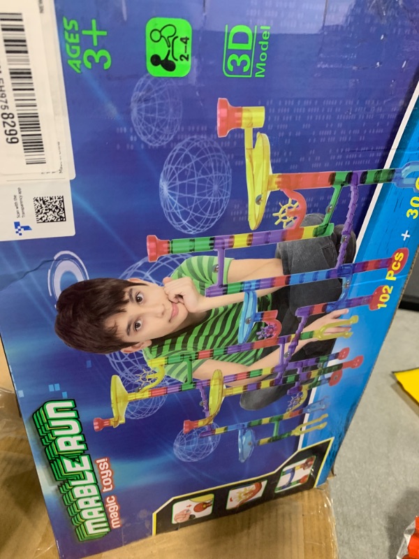 Photo 1 of Meland Marble Run - 132Pcs Marble Maze Game Building Toy for Kid, Marble Track Race Set & STEM Learning Toys for Boy Girl Age 3 4 5 6 7 8 9+ (102 Translucent Marbulous Pcs & 30 Glass Marbles)