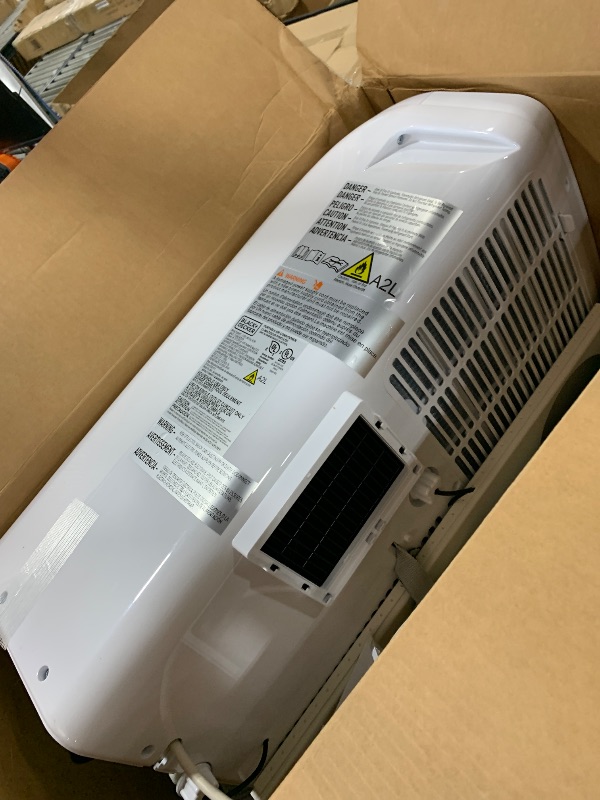 Photo 1 of BLACK+DECKER 8,000 BTU Portable Air Conditioner for Rooms up to 350 Sq. with Remote Control, White