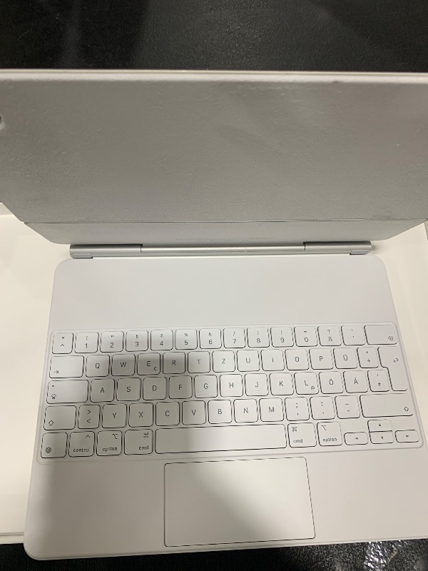 Photo 1 of Apple Magic Keyboard: iPad Keyboard and case for iPad Pro 12.9 inch (3rd, 4th, 5th and 6th gen) and iPad Air (M2), Great Typing Experience, Built-in trackpad, German - White