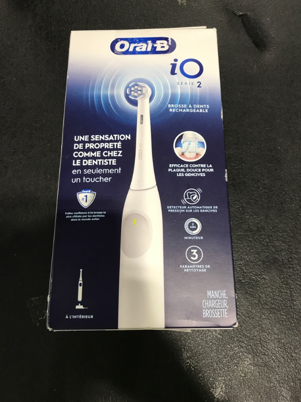 Photo 1 of Oral-B iO Series 2 Rechargeable Electric Powered Toothbrush, Pure White with 1 Gentle Care Brush Head - Automatic Pressure Sensor to Protect Gums - 3 Modes - 2 Min Timer