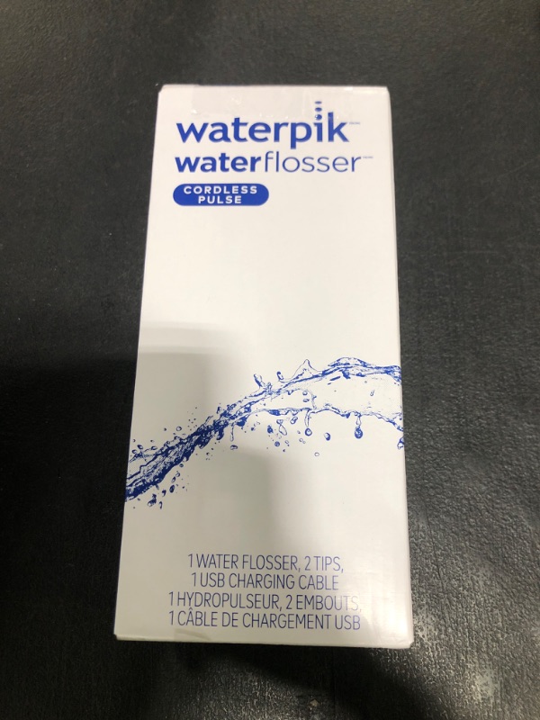 Photo 1 of Waterpik Cordless Pulse Rechargeable Portable Water Flosser for Teeth, Gums, Braces Care and Travel with 2 Flossing Tips, Waterproof, ADA Accepted, WF-20 White, Packaging May Vary