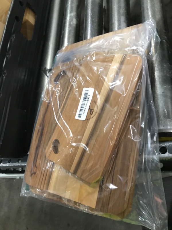 Photo 1 of Lipper International Teak Wood Cutting Boards with Oval Holes in Corners, Assorted Sizes, Set of 3