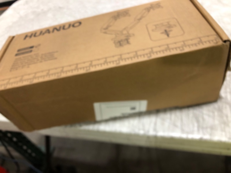 Photo 1 of HUANUO Dual Monitor Stand - Full Adjustable Monitor Desk Mount Swivel Vesa Bracket with C Clamp, Grommet Mounting Base for 13 to 32 Inch Computer Screens - Each Arm Holds 4.4 to 19.8lbs