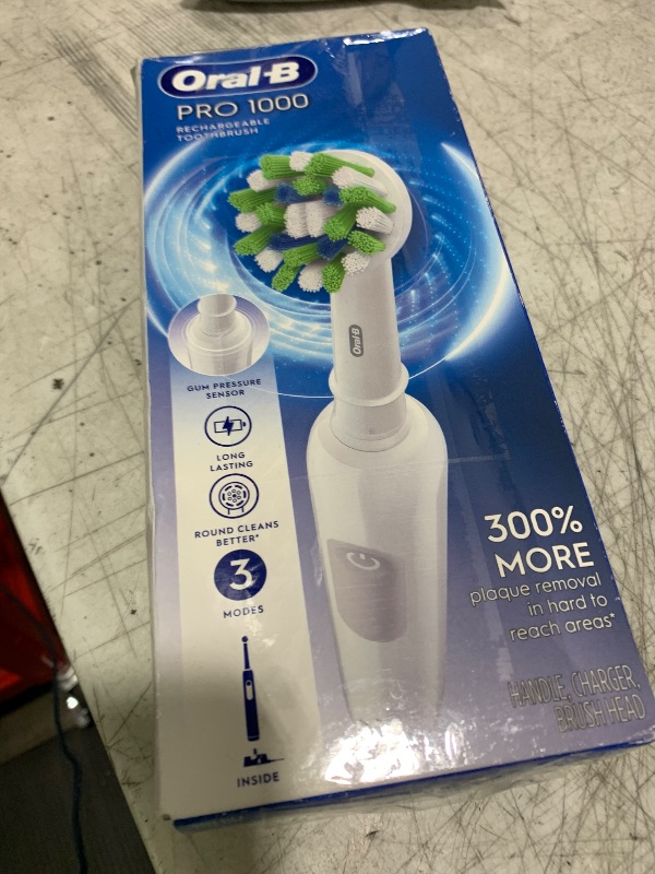 Photo 1 of Oral-B Pro 1000 Rechargeable Electric Toothbrush, White