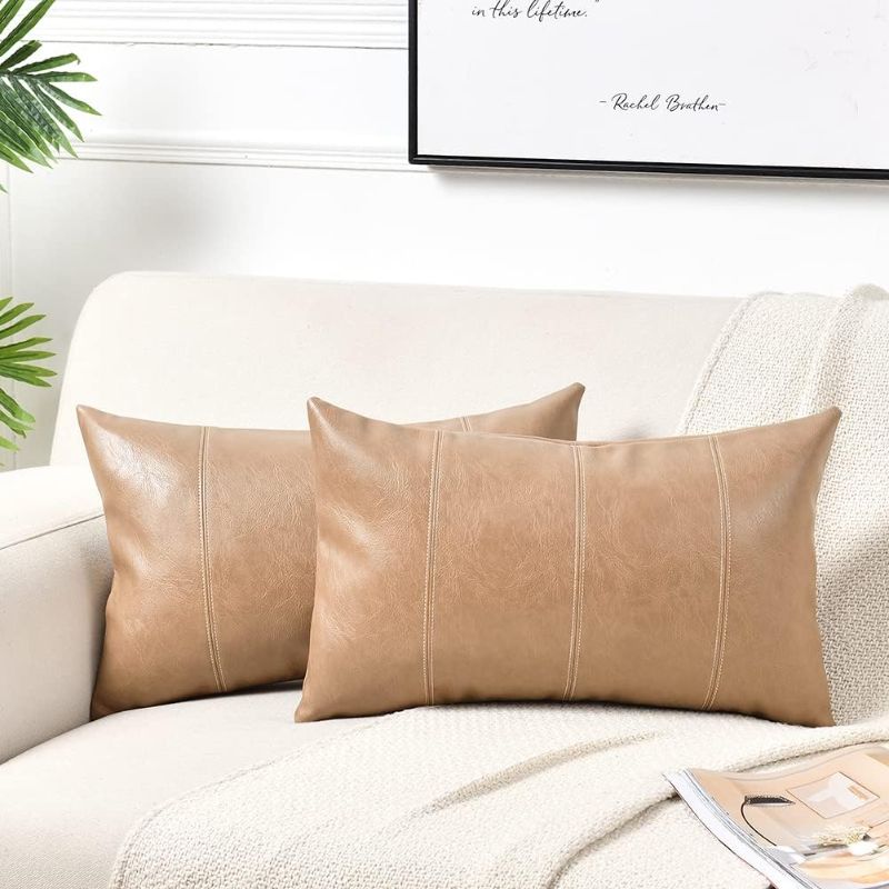 Photo 1 of Fancy Homi 2 Packs Tan Lumbar Waterproof Faux Leather Decorative Throw Pillow Covers 12x20 Inch for Outdoor Couch Bed, Beige Hand Stitched Cushion Case 30x50 cm, Taupe Modern Farmhouse Home Decor
