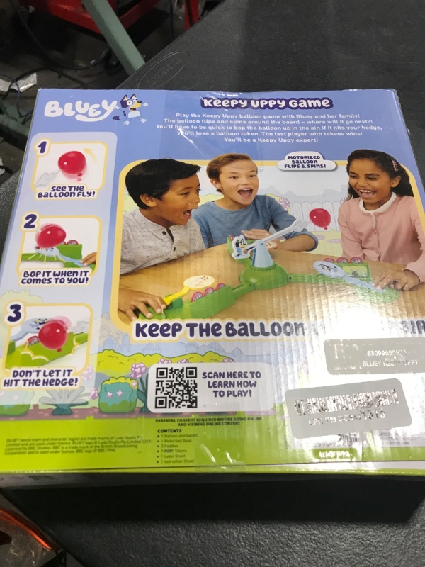 Photo 1 of Bluey Keepy Uppy Game. Help, Bingo, and Chilli Keep The Motorized Balloon in The Air with The Character Paddles for 2-3 Players. Ages 4+