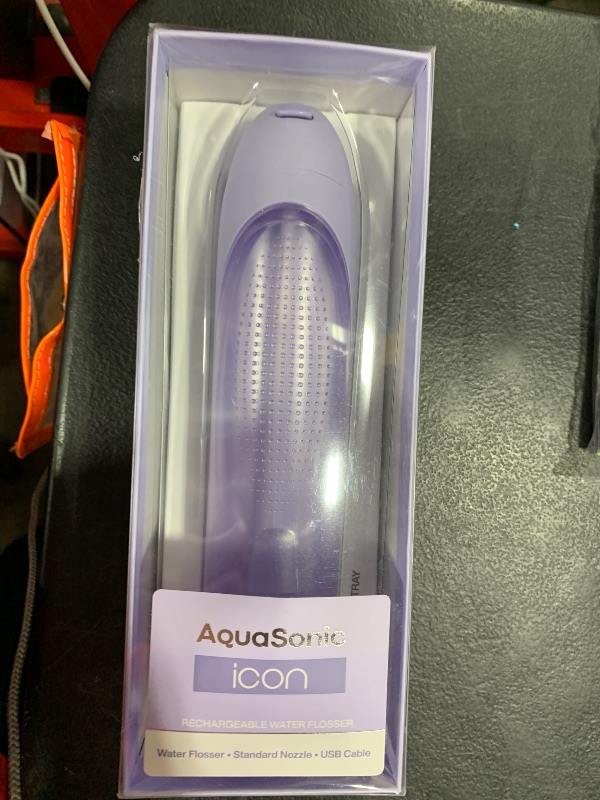 Photo 1 of AquaSonic Icon Water Flosser for Teeth – Cordless Rechargeable Oral Irrigator – Waterproof, Portable Dental Cleaning with Jet Tip – Braces Home Travel - Lilac