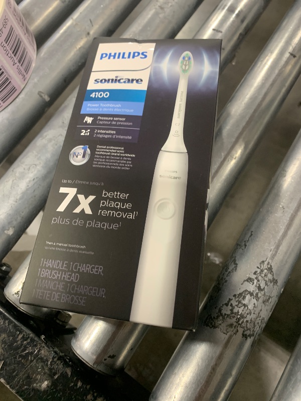 Photo 1 of Philips Sonicare 4100 Rechargeable Electric Toothbrush, with Pressure Sensor, 2 Intensity Settings, SmarTimer and QuadPacer, 14-Day Battery Life, White, Model HX3681/23