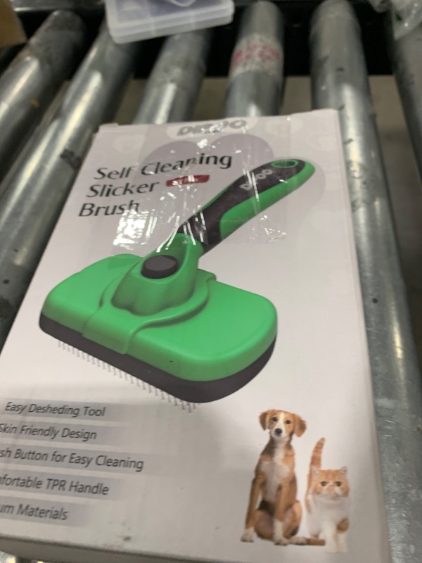 Photo 1 of Dipoo Self Cleaning Deshedding Brush for Dogs & Cats - Skin Friendly Grooming Tool with Hair Removal for Haired Pets, Green