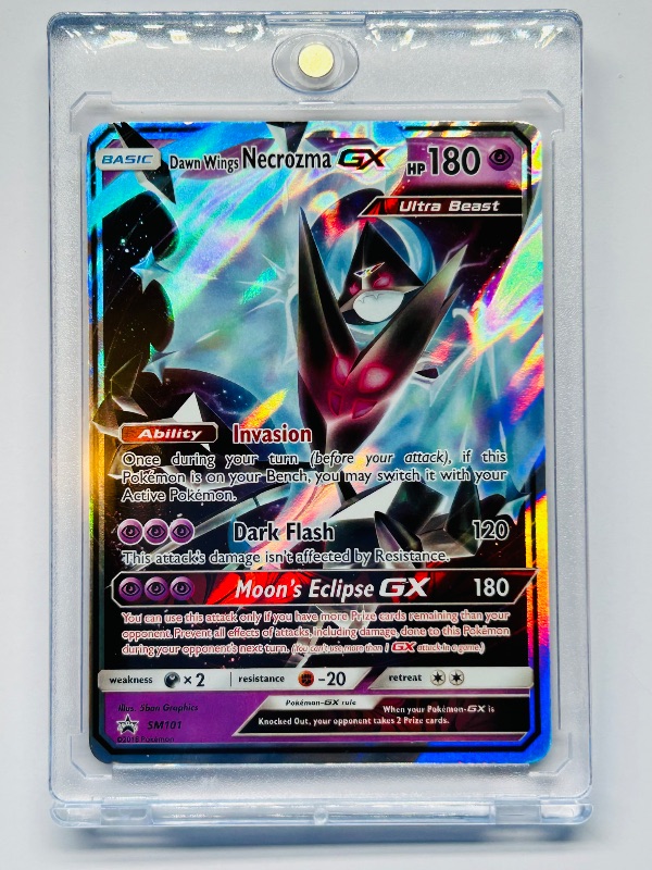 Photo 1 of 593032…Pokémon holo Dawn Wings Necrozma GX card  in hard plastic case