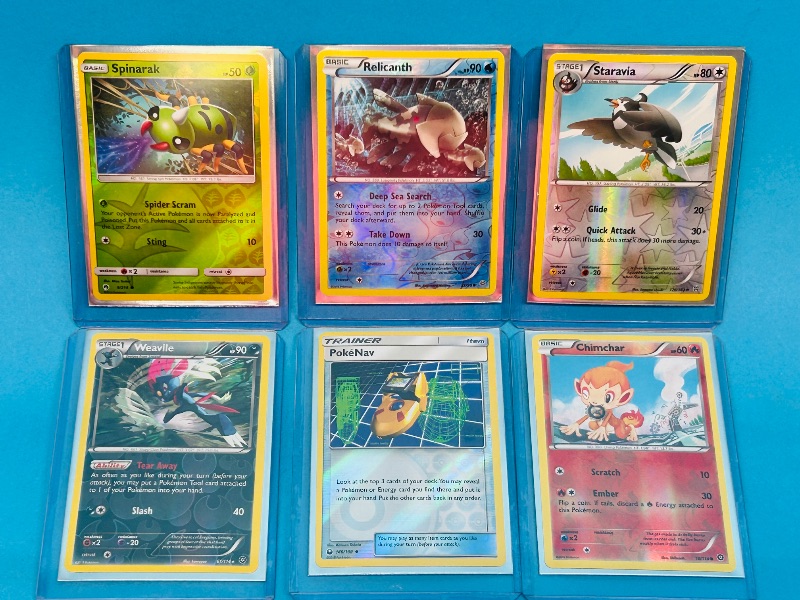 Photo 1 of 593059…6 reverse holo Pokémon cards in hard plastic sleeves 