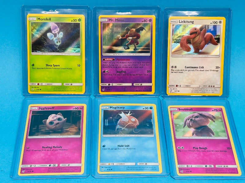Photo 1 of 593101…6 Hologram Pokémon cards in hard plastic sleeves 