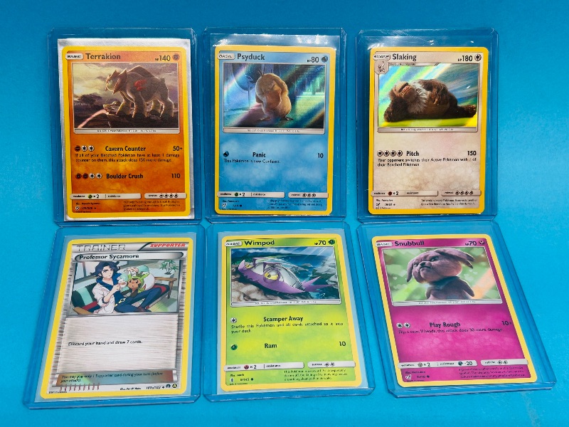 Photo 1 of 593105… 6 hologram Pokémon cards in hard plastic sleeves 