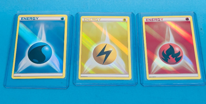 Photo 1 of 593107…3 hologram Pokémon cards in hard plastic sleeves 