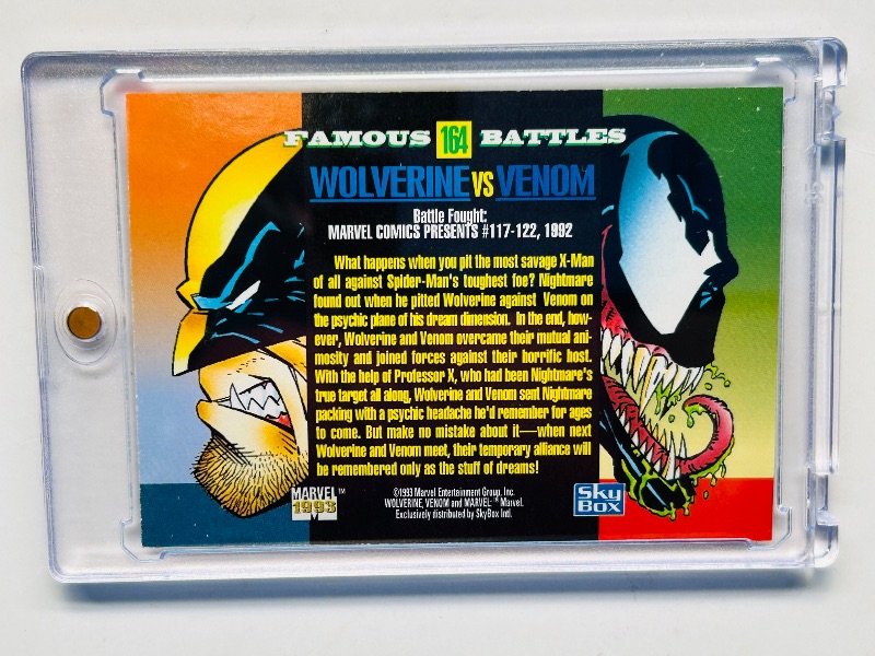 Photo 1 of 593110…Marvel Wolverine vs. Venom card 164 in hard plastic case