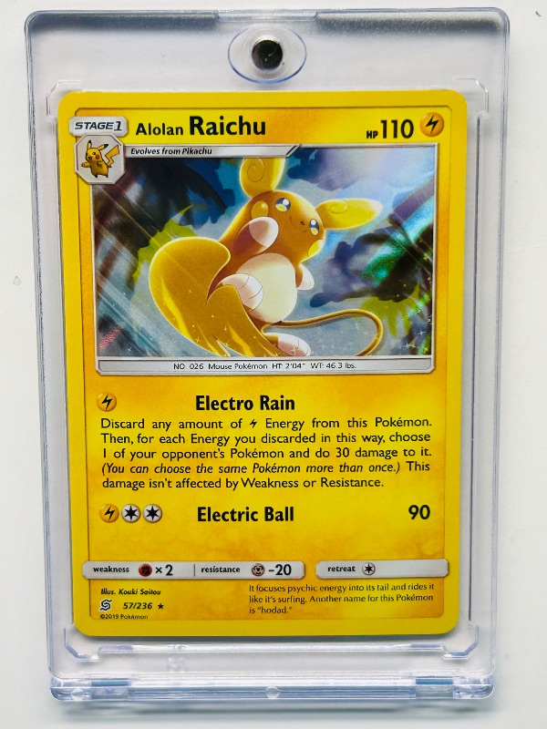 Photo 1 of 593119… Pokémon hologram Alolan Raichu card in hard plastic case