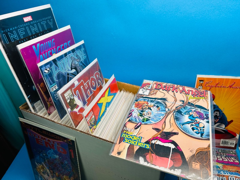Photo 1 of 593211… final sale no returns/refunds- 140+ mixed comics in box-most sleeved 