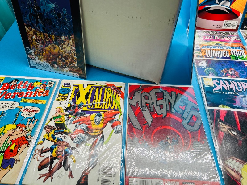 Photo 1 of 593211… final sale no returns/refunds- 140+ mixed comics in box-most sleeved 