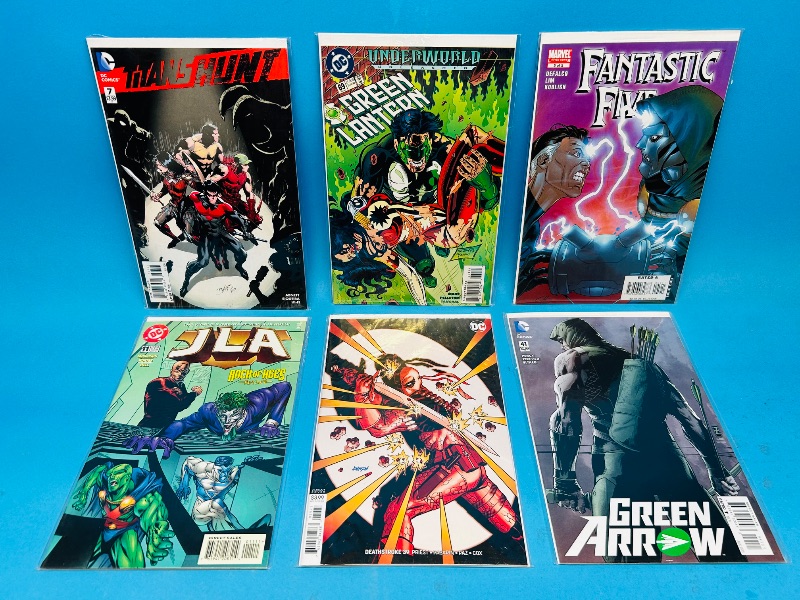 Photo 1 of 593229…6  comics in plastic sleeves 