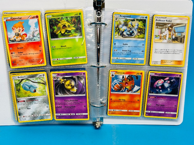 Photo 1 of 593236…final sale no returns/refunds -160 mixed Pokemon cards in binder