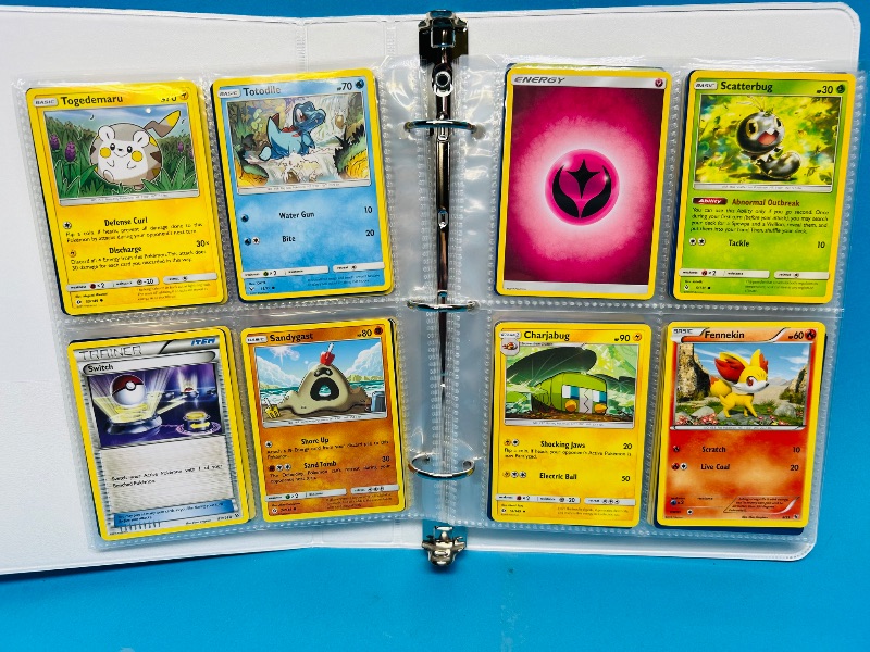 Photo 1 of 593236…final sale no returns/refunds -160 mixed Pokemon cards in binder