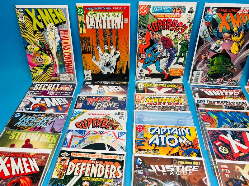 Photo 1 of 593244… final sale no returns/refunds-30 comics in plastic sleeves 