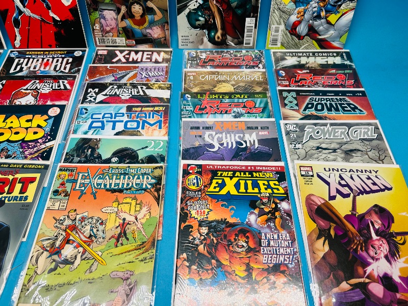 Photo 1 of 593245… final sale no returns/refunds-30 comics in plastic sleeves 