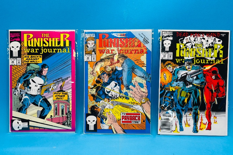 Photo 1 of 593251…3 Punisher comics in plastic sleeves 
