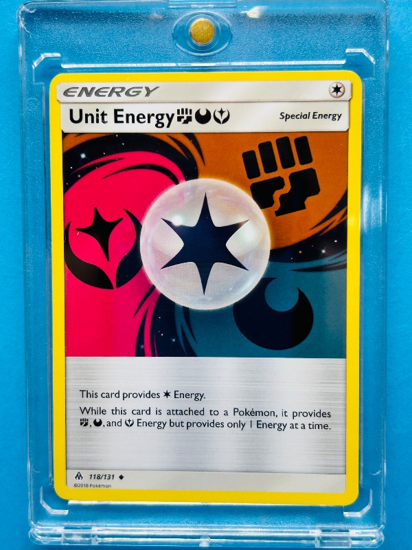 Photo 1 of 593286…Unit Energy Pokémon card in hard plastic case