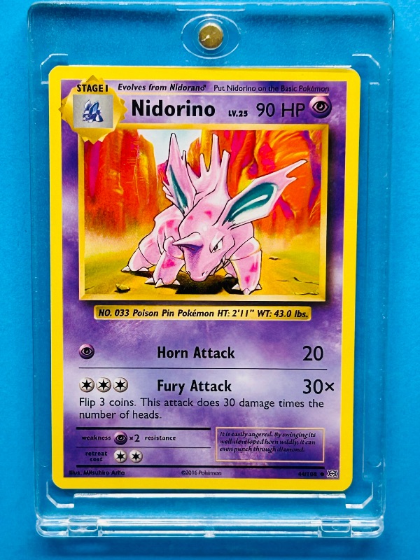 Photo 1 of 593290…Nidorino Pokémon card in hard plastic case