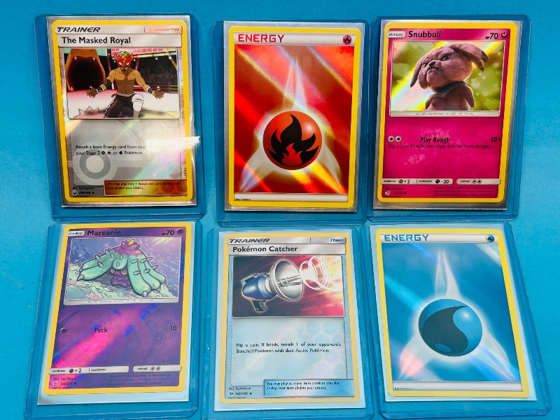 Photo 1 of 593317… 6 holo and reverse holo Pokémon cards in hard plastic sleeves 