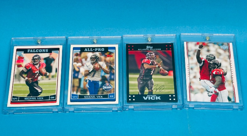 Photo 1 of 593324…4 Michael Vick cards in hard plastic cases