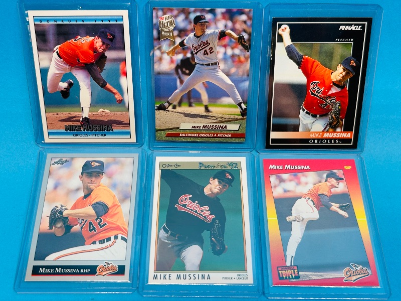 Photo 1 of 593325…Mike Mussina cards in hard plastic sleeves 